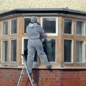 Paint stripping bay window.
